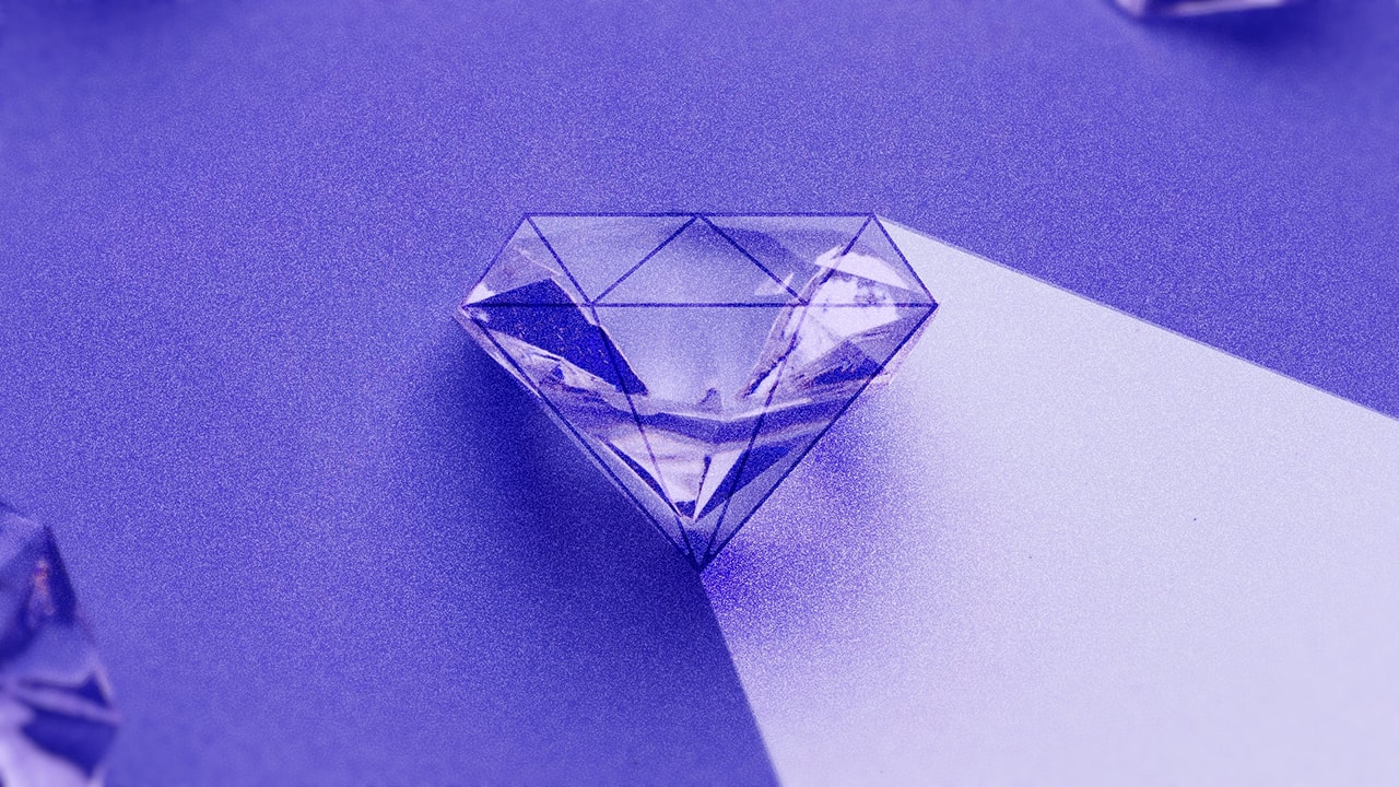 Close-up photo of a beautiful purple colored diamond