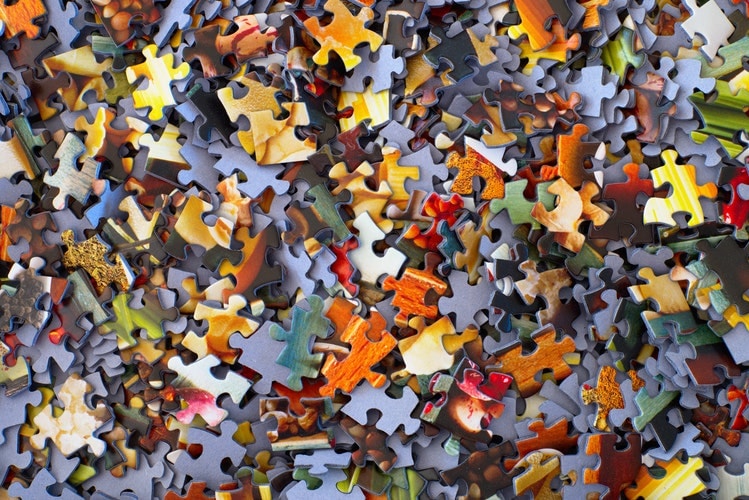 Heap of colorful puzzle blocks