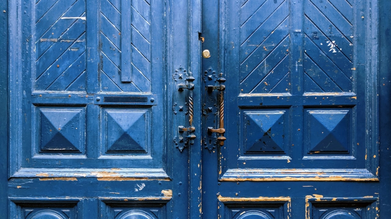 Blue colored wooden door