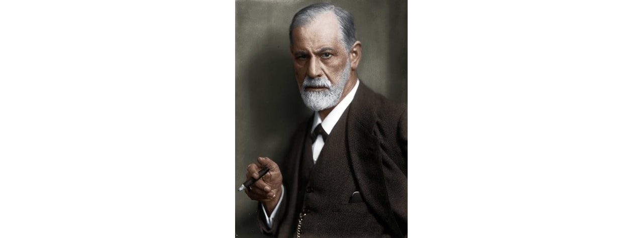 Photograph of Sigmund Freud holding a cigar